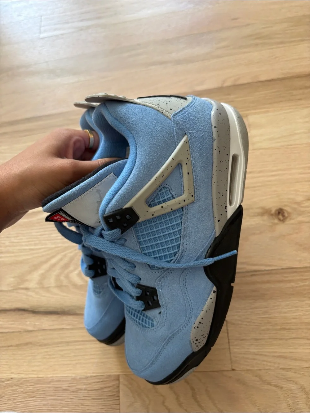 Air Jordan 4 Retro “University Blue” (also called Jordan 4 UNC/University Blue)